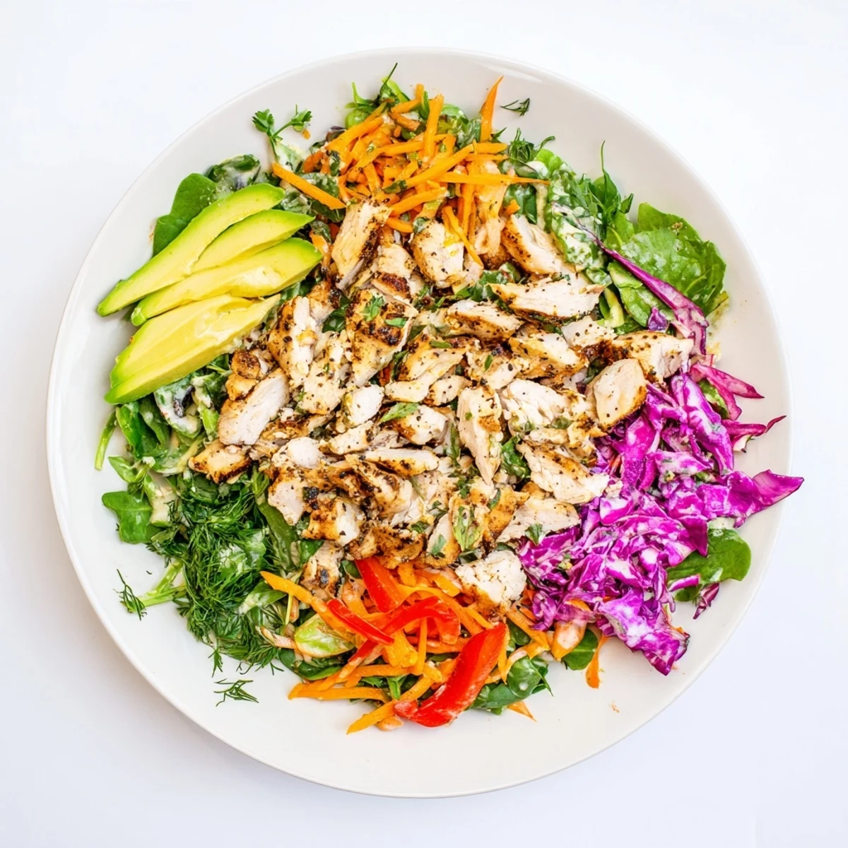 Close up shows a Poppy-Inspired Chicken Salad Wrap cut open, revealing chicken and vibrant veggies.