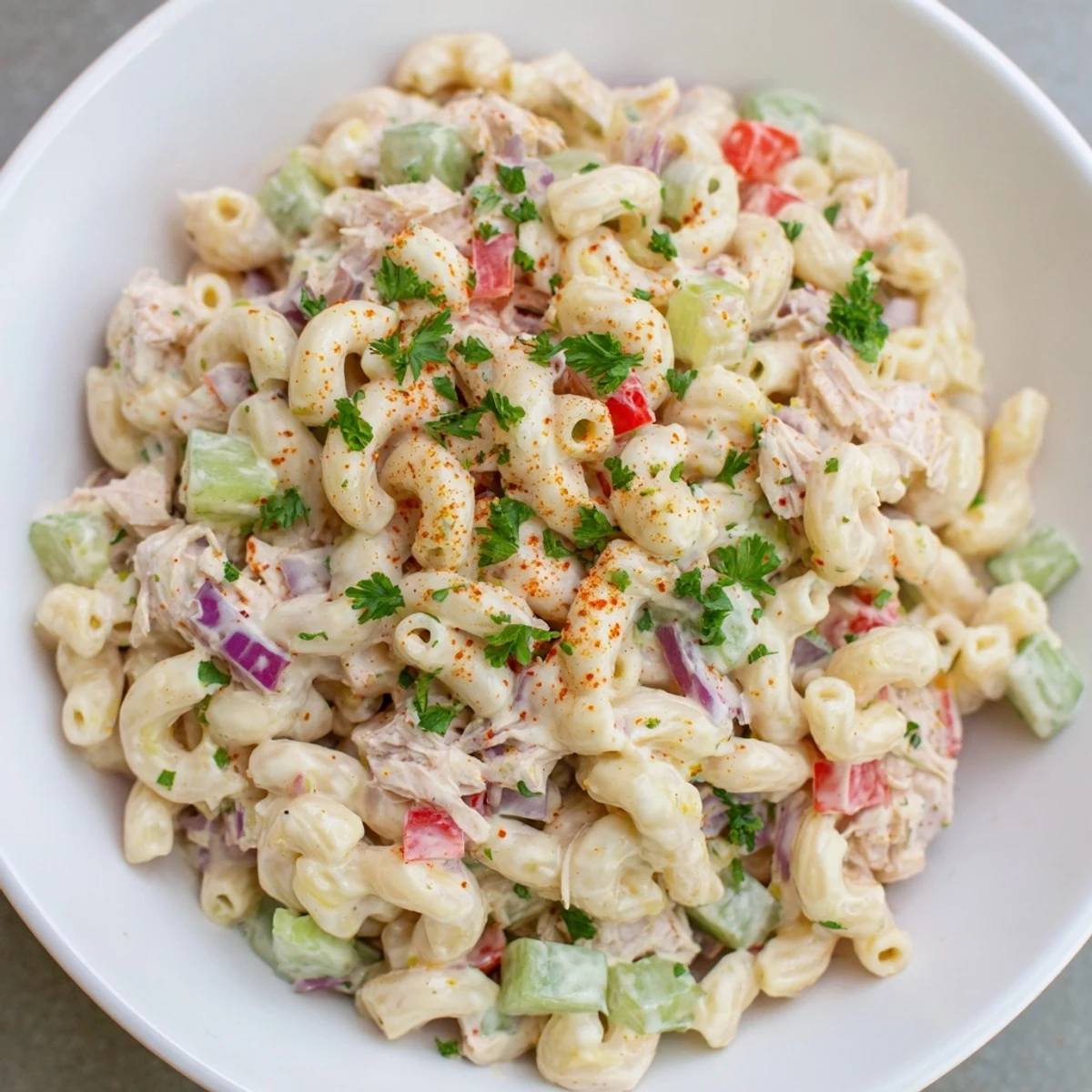 Chicken Macaroni Holiday Salad, a creamy, cold salad with macaroni and chicken ready for serving.