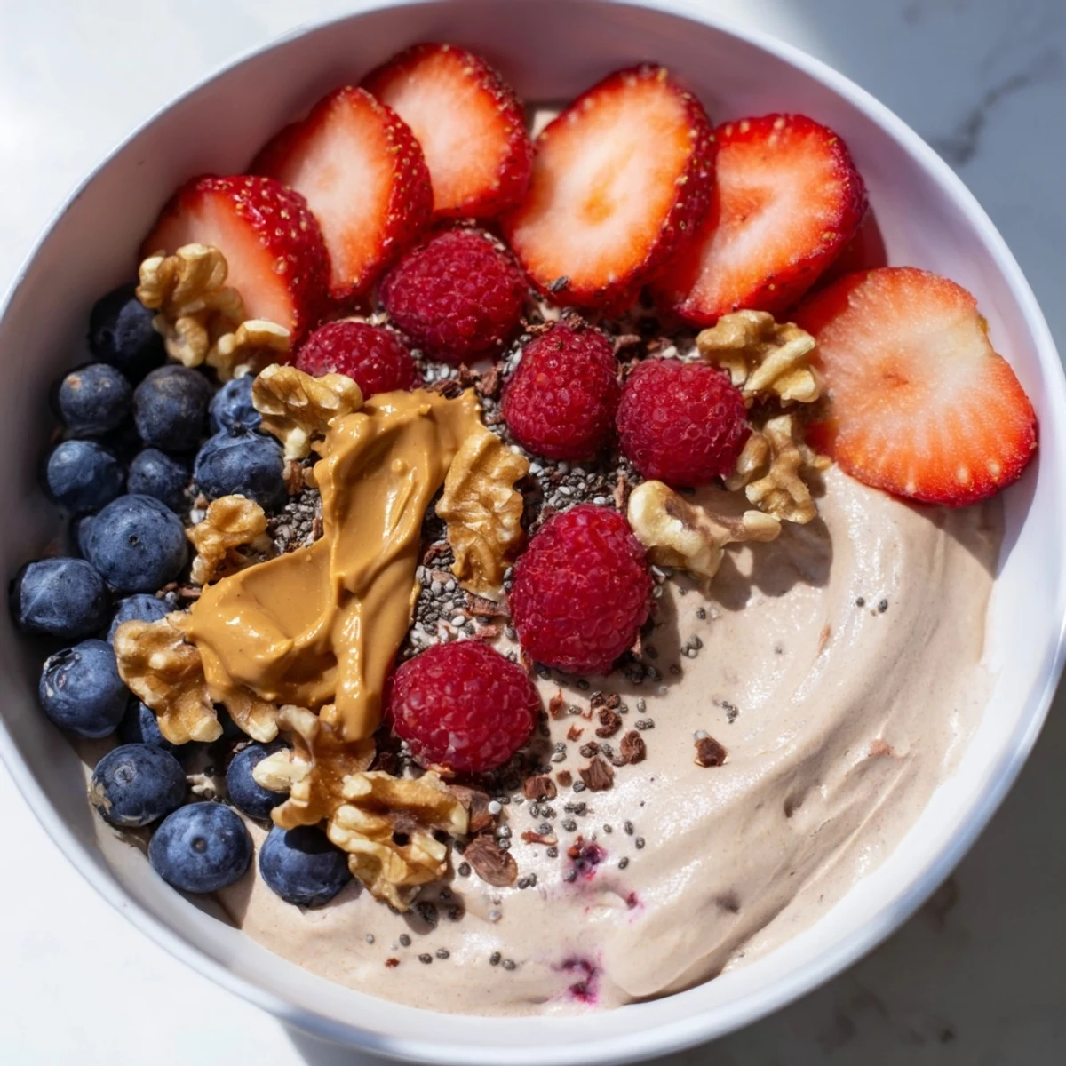 Enjoy a delicious and healthy Protein Ice Cream Bowl, easily customizable with your favorite toppings.