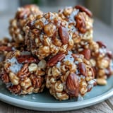 Sweet and salty caramel popcorn with roasted peanuts, perfect for movie nights or baseball viewing parties.  