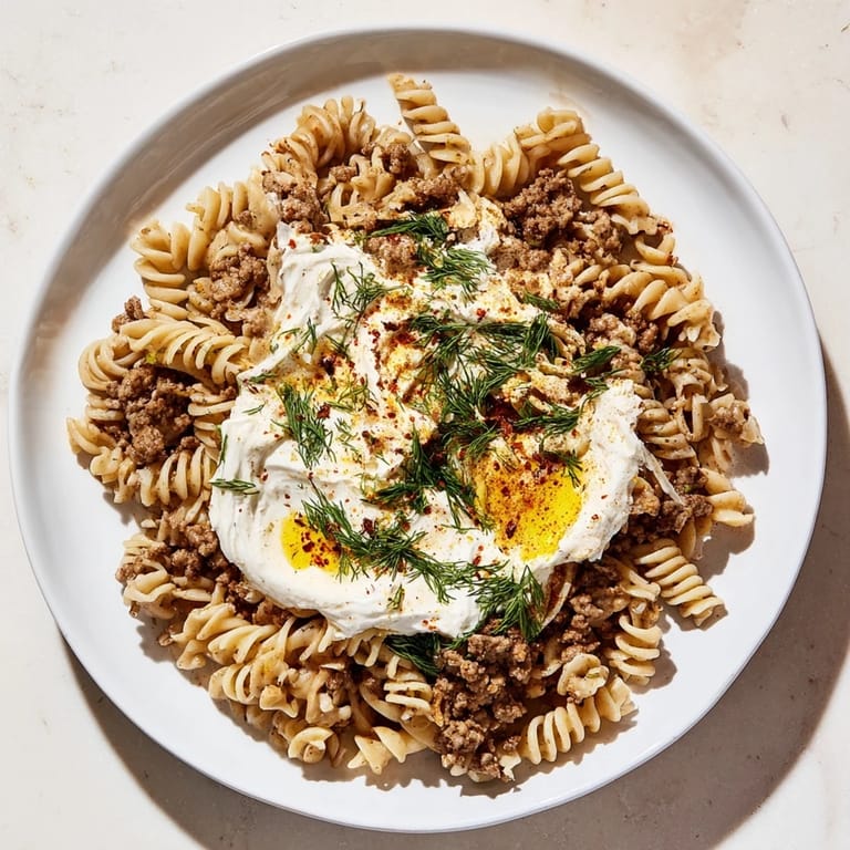 A close-up shot of Turkish Pasta with Ground Turkey showcasing the savory ground turkey and pasta.