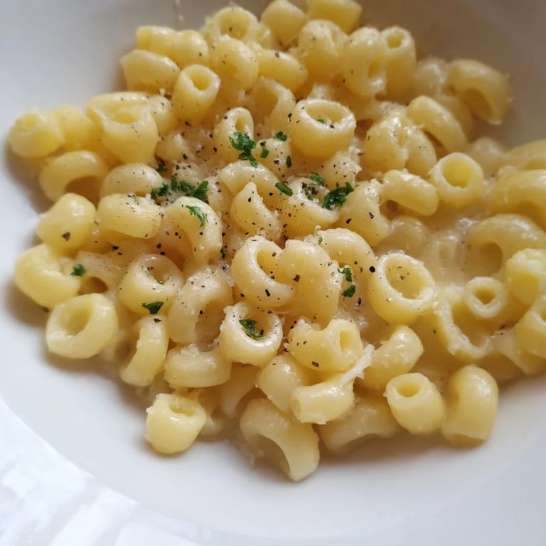 Creamy one-pot garlic butter ditalini, a comforting Italian-American pasta dish, ready in fifteen minutes.