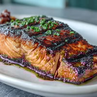 Vibrant grilled salmon power bowl with quinoa, avocado, and zesty citrus dressing, perfect for a healthy lunch or dinner.  